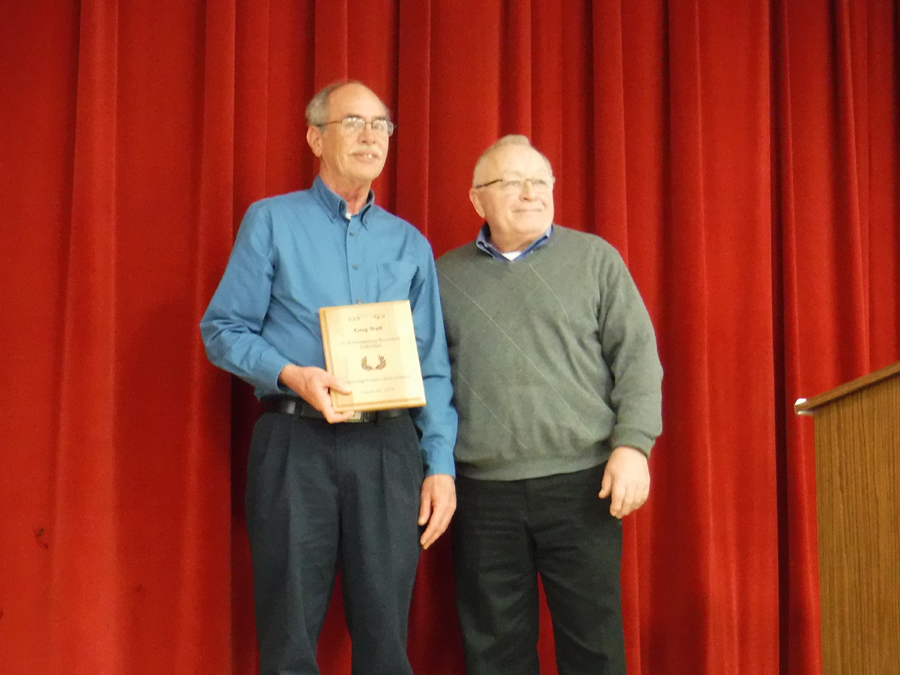 Greg Wall accepts the award for Outstanding Watershed Individual presented by John Linkes